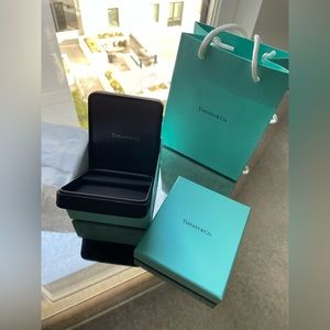 Tiffany blue box, earring box with Tiffany tissue paper and small Tiffany bag.